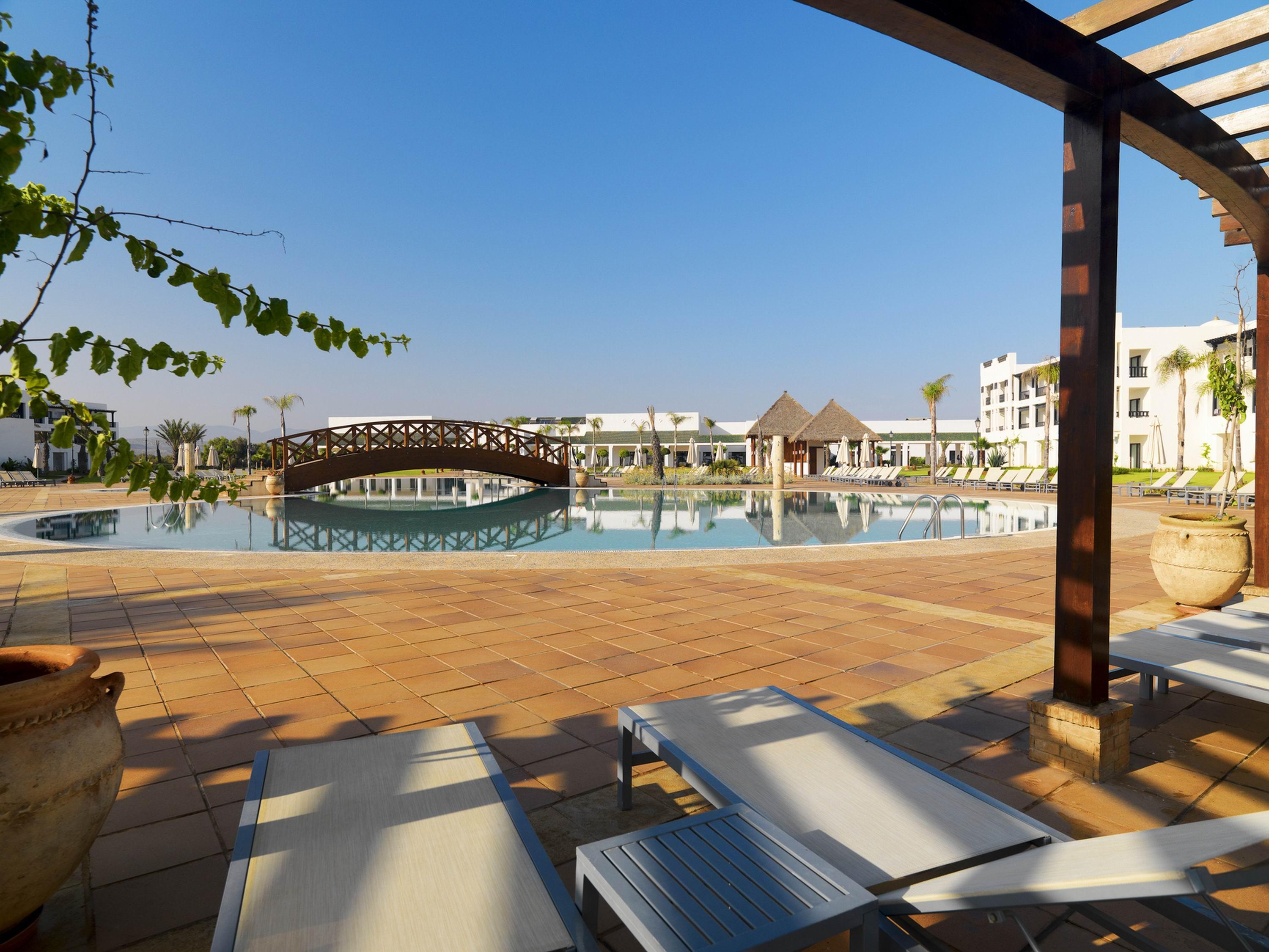 Отель Iberostar Waves Саидия Экстерьер фото A pool at the hotel